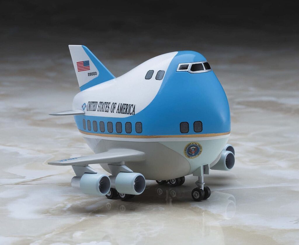 Stubby toy-style model of Air Force One, a blue and white 747 lettered United States of America with the presidential seal